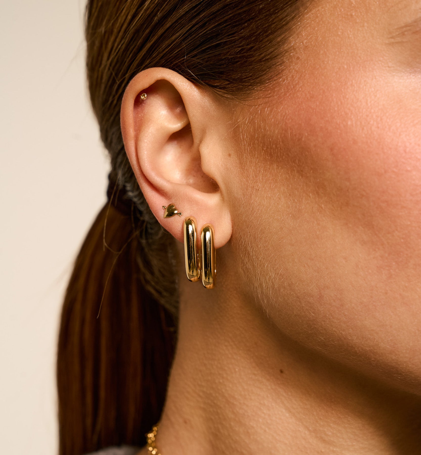 Single Cupid Stud Oorring Goud